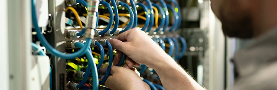 Hands connecting cables